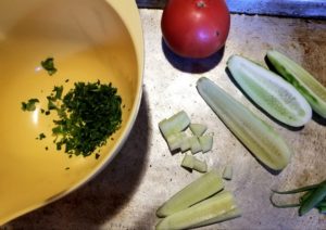 Cutting ingredients on the bed.