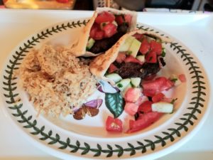 Losh kebab dinner served with pita breadd with oita