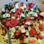 Armenian chopped salad of tomatoes, cucumbers, bell pepper, parsley and mint