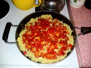 Add in macaroni, tomato sauce, red bell pepper and Worcestershire sauce