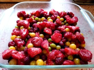 Fruit in even layer in baking dish.