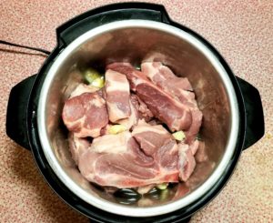 Uncooked Country Style Ribs in Instant Pot.